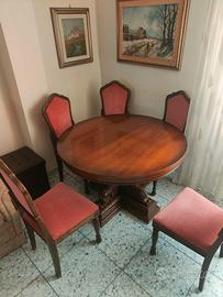 Tavolo rotondo allungabile intagliato con 6 sedie