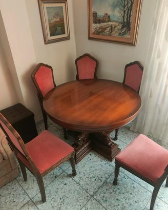 Tavolo rotondo allungabile intagliato con 6 sedie