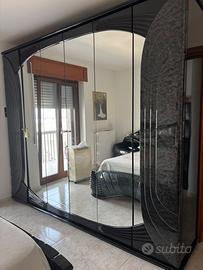 Camera da letto matrimoniale nera lucida con LED