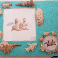 Cornice da tavolo con conchiglie