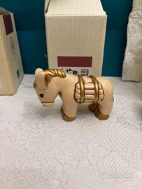 Thun asino con soma presepe classico champagne