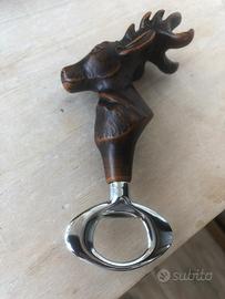 Apribottiglie artigianali in legno pregiato.