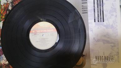 ELTON Reg Strikes Back - McCartney FLOWERS in Dirt