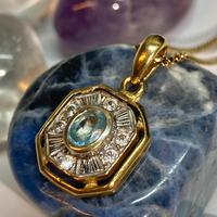 Pendente oro giallo, acquamarina e zirconi