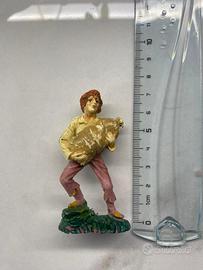 Statuina presepe in plastica uomo con sacco