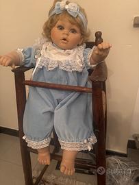 Bambola di porcellana nuova con vestito in velluto
