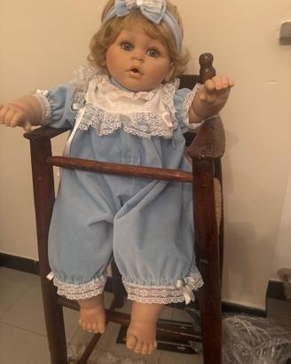 Bambola di porcellana nuova con vestito in velluto