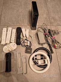 Nintendo Wii + Wii Fit Plus + giochi e accessori