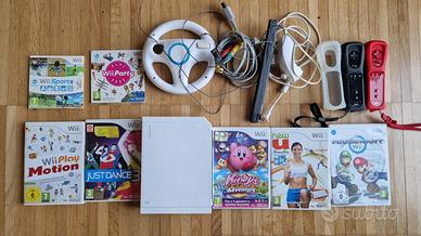 Nintendo WII con accessori con 7 applicativi