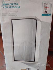 Armadietto con specchio girevole  bianco