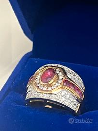 Anello in oro 18kt con diamanti e rubini naturali