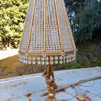 Lampada da tavolo in ghisa e cristallo