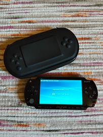 Psp Sony nera + 4 giochi