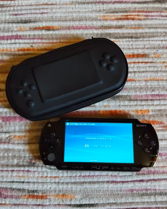 Psp Sony nera + 4 giochi