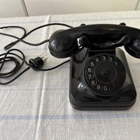 Telefono a disco in bachelite nero vintage