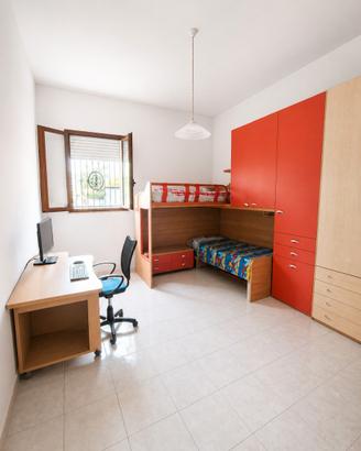 Trilocale con cortiletto in contesto silenzioso