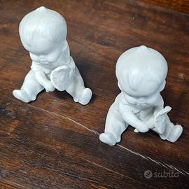 coppia statue bambini capodimonte