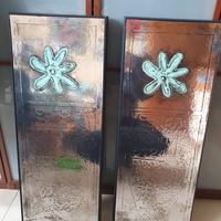 Due quadri su lamina cromata