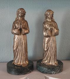 Coppia statuette epoca bronzo fuso argentato 
