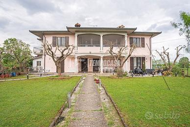 PORZIONE DI VILLA BIFAMILIARE CON TERRAZZO