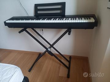 Piano digitale portatile con base
