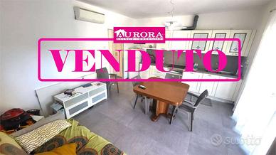 GRAZIOSO BILOCALE con CORTE ESCLUSIVA E GARAGE