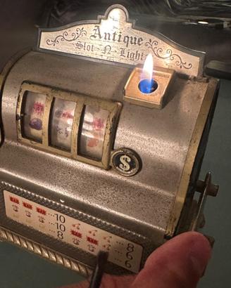 Accendino vintage “Antique Slot-N-Lighter” funzion