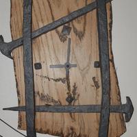 Orologio composto da vecchi chiodi