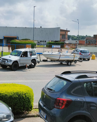 Barca open 7 posti con carrello 25 / 50 cv