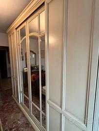 Camera con armadio scorrevole