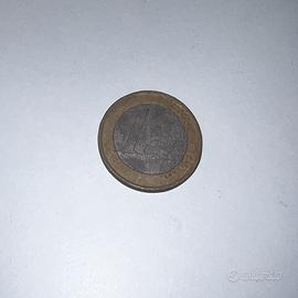 Moneta da un’euro con dietro l’albero della vita