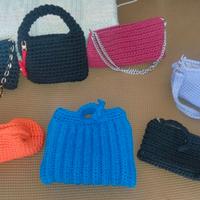 Borsette artigianali di cotone fatte all'uncinetto