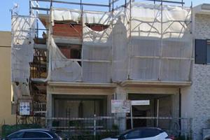 Villetta singola a schiera rustica