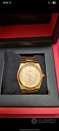 Tissot PRX 44mm oro