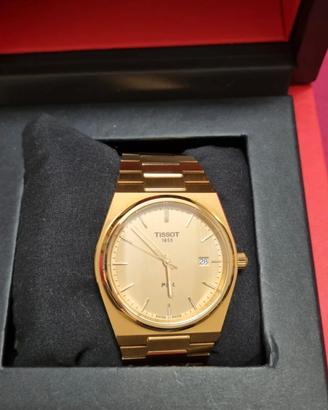 Tissot PRX 44mm oro