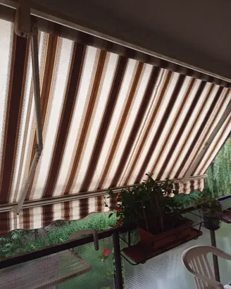 Mobili salotto,tenda terrazzo,divano angolare