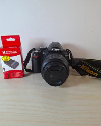 macchina fotografica nikon d3000, caricabatterie