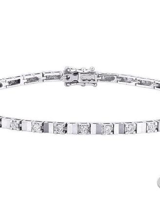 BRACCIALE TENNIS ORO 18kt. CON DIAMANTI ALTERNATI