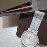 Orologio colonna con cinturino in tessuto