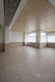 NEGOZIO A GRASSOBBIO