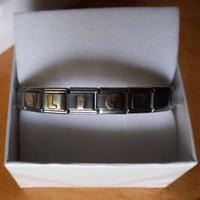 bracciale  in acciaio con lettere in oro "ALICE"