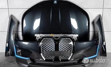 BMW iX I20 musata proiettori radiatori paraurti co