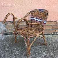 Seggiolino vintage in vimini