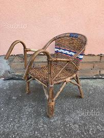 Seggiolino vintage in vimini