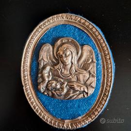 Medaglione capoculla vintage in argento 800