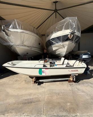 Boston Whaler 13 con motore Yamaha 25 top 700 2T