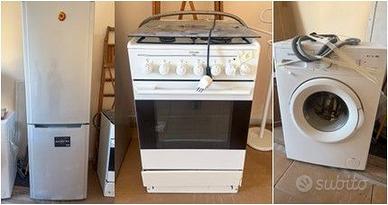 Tris elettrodomestici (frigo, cucina e lavatrice)