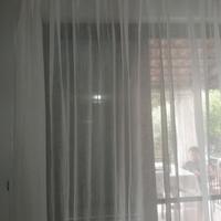 Tenda trasparente da appendere con anelli 