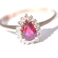 Anello Oro bianco 18kt 16 diamanti e Rubino goccia