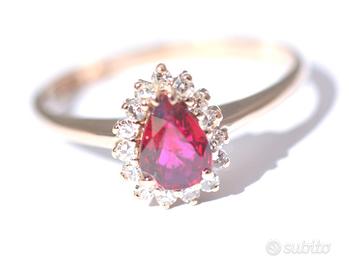 Anello Oro bianco 18kt 16 diamanti e Rubino goccia